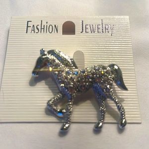Horse brooch